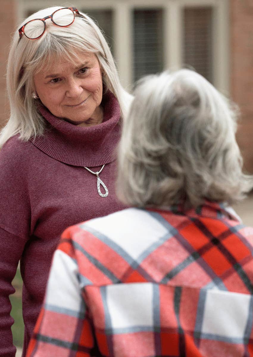 middle age woman with no energy reluctantly taking financial advice