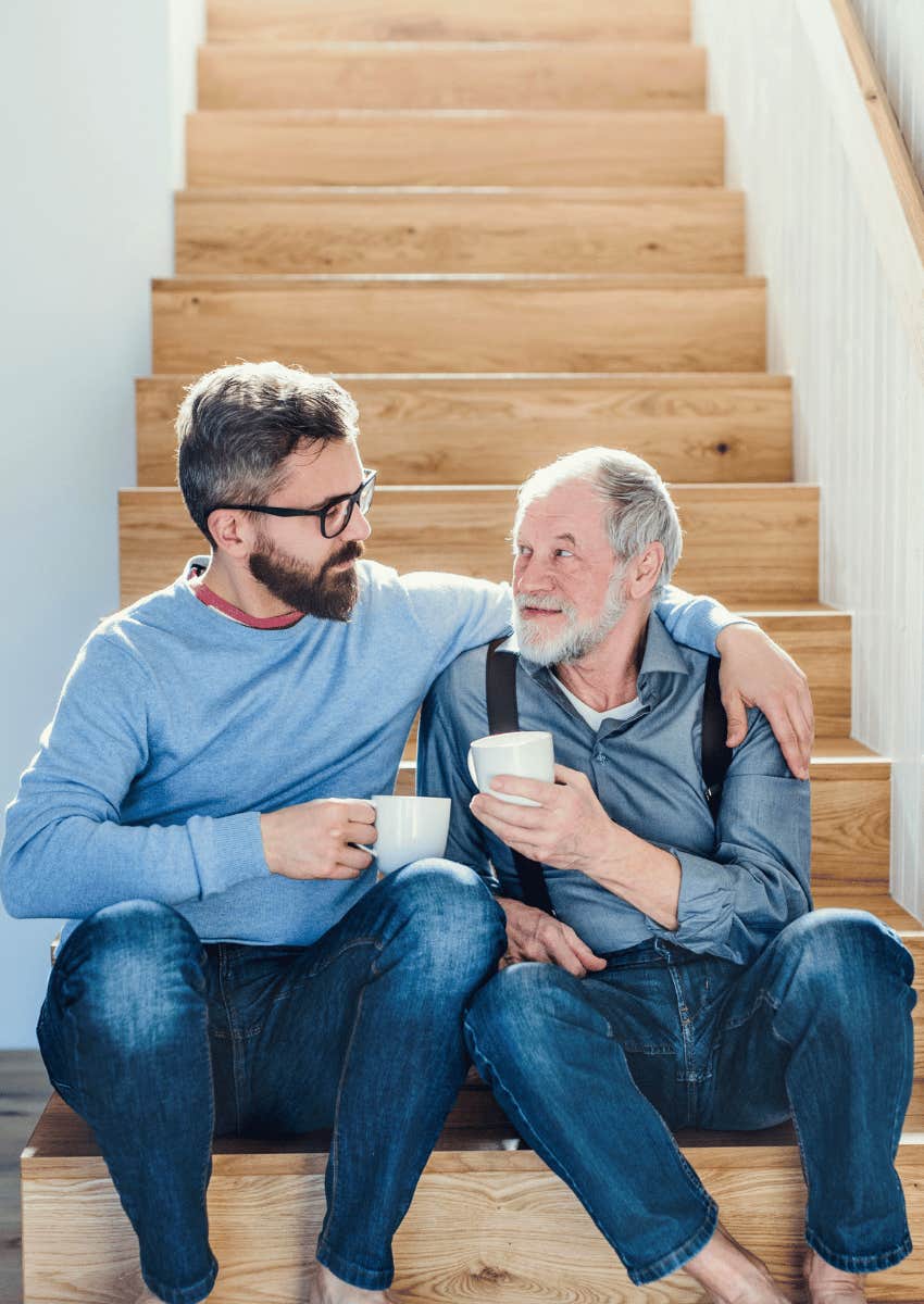 millennial man sitting next to his boomer parent