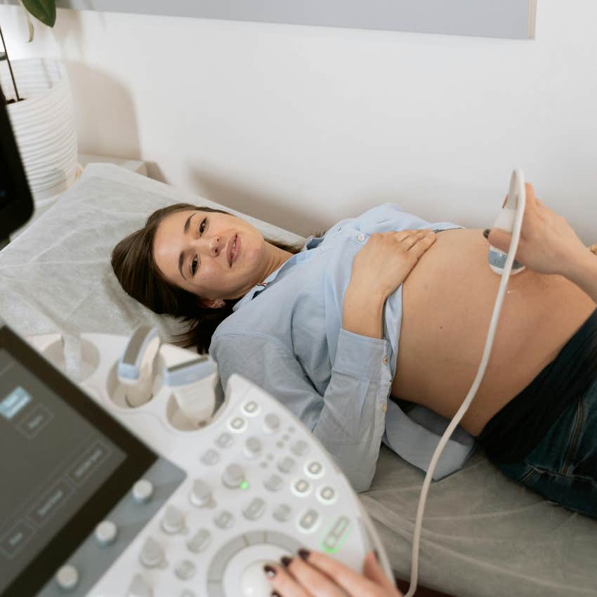 mom getting ultrasound in hospital before giving birth
