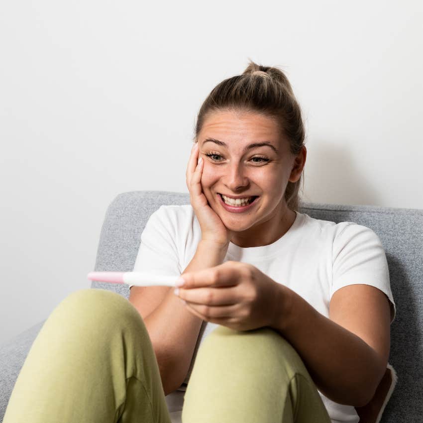 woman excited to find out she's pregnant