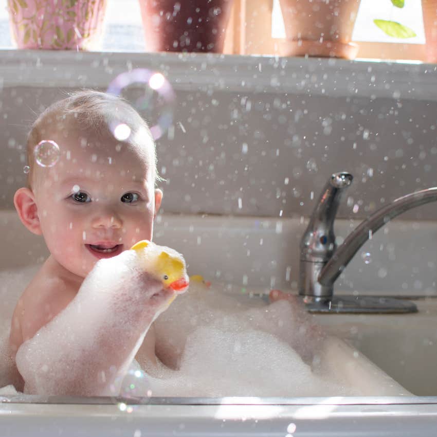 baby bathing in kitchen sink unsafe and unsanitary