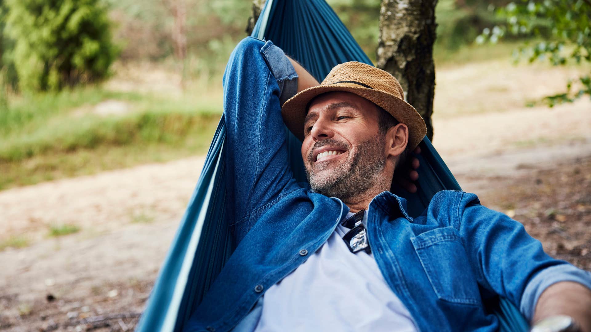 man in blue jacket relaxing in a safe environment