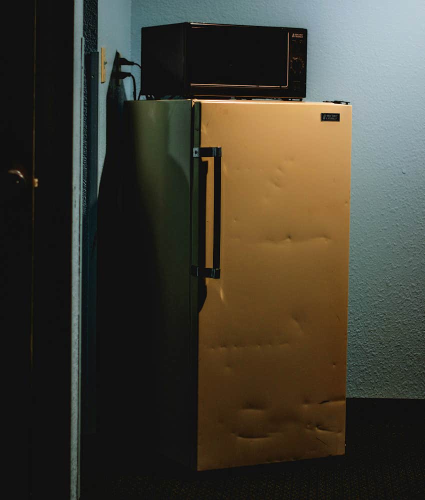 old fridge and microwave still in use showing they did not break