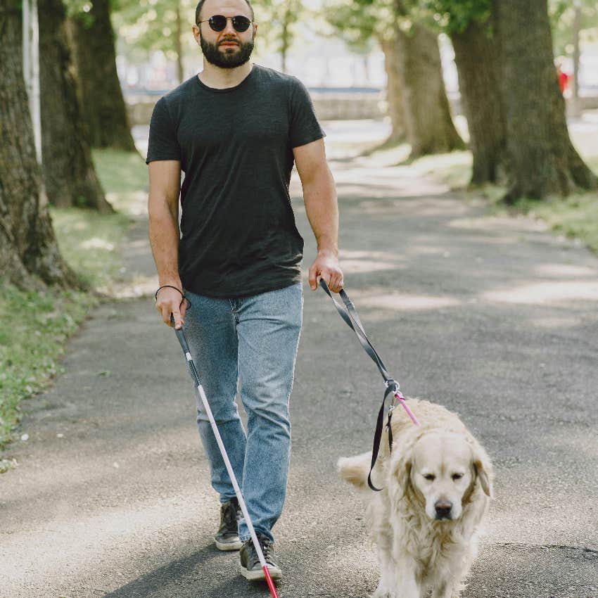 blind man with his service dog