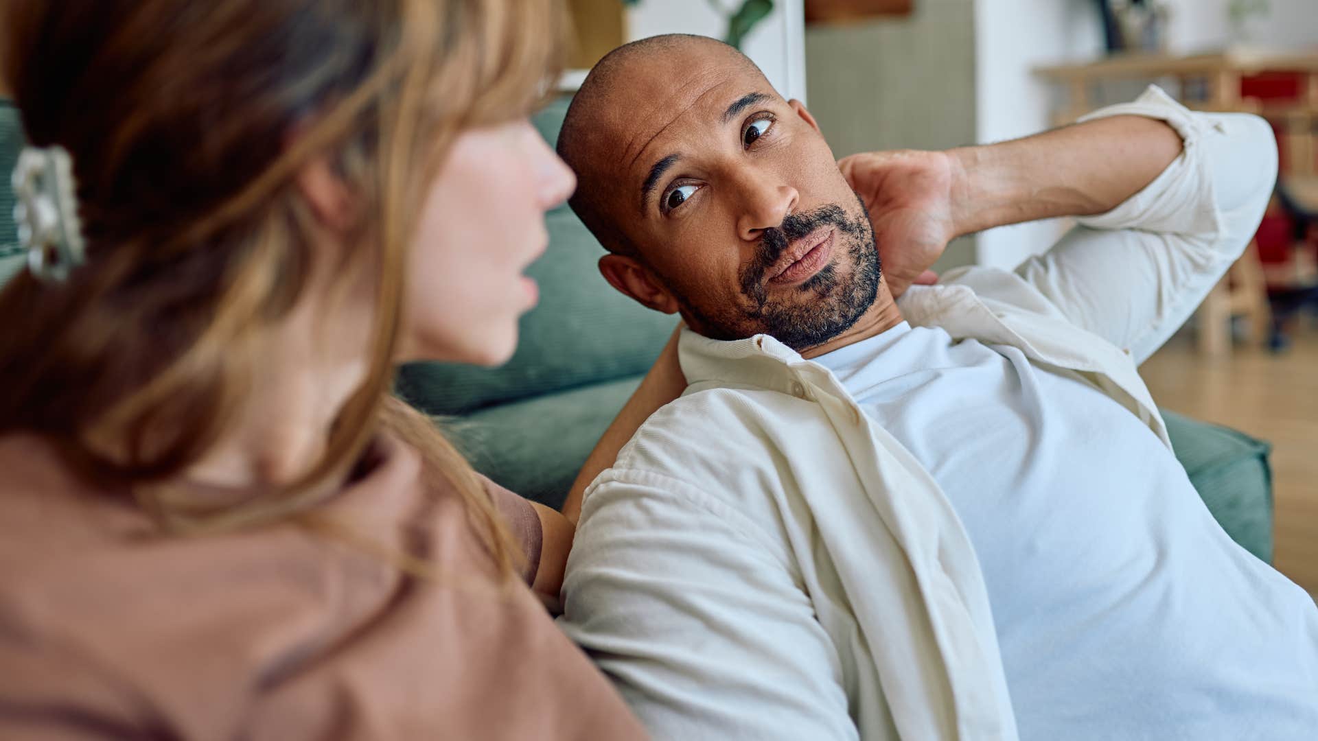 man having a surface-level conversation with friend