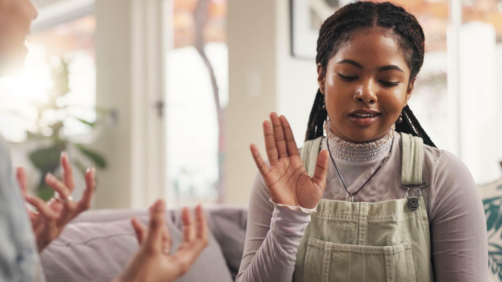 woman who's inconsistent looking disengaged during a conversation