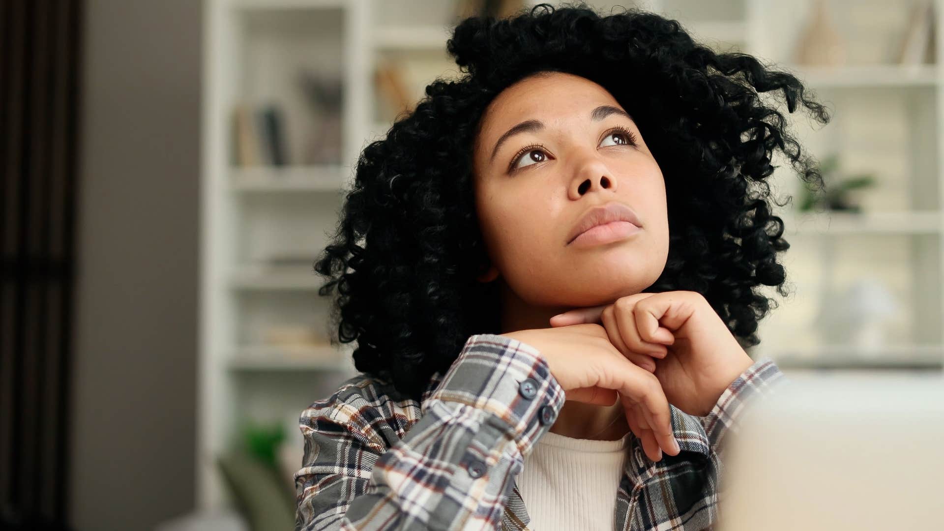 woman who always finds space to daydream at home