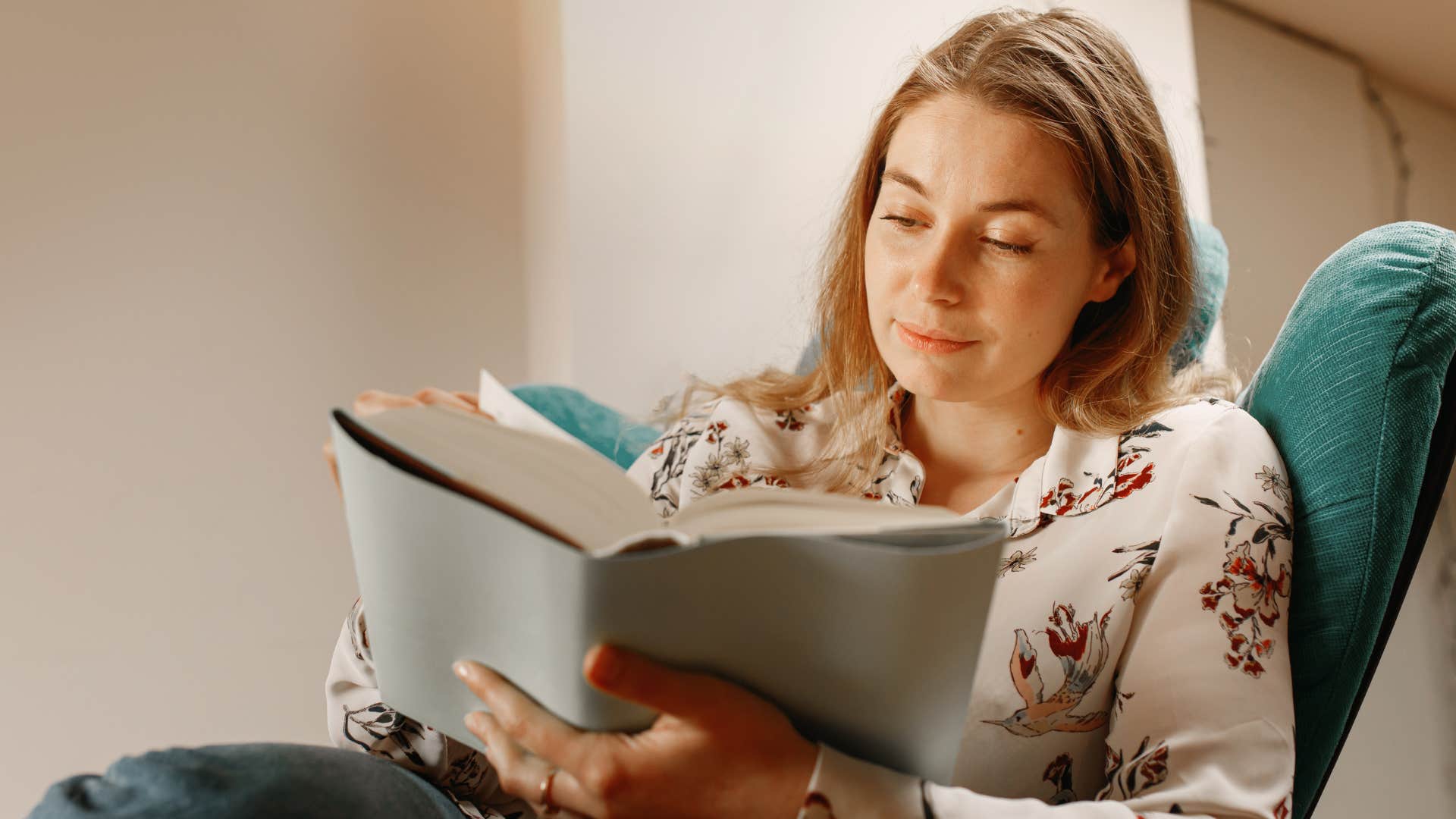 high iq woman choosing to read over doomscrolling 