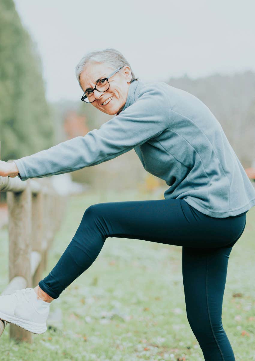 older woman stretching