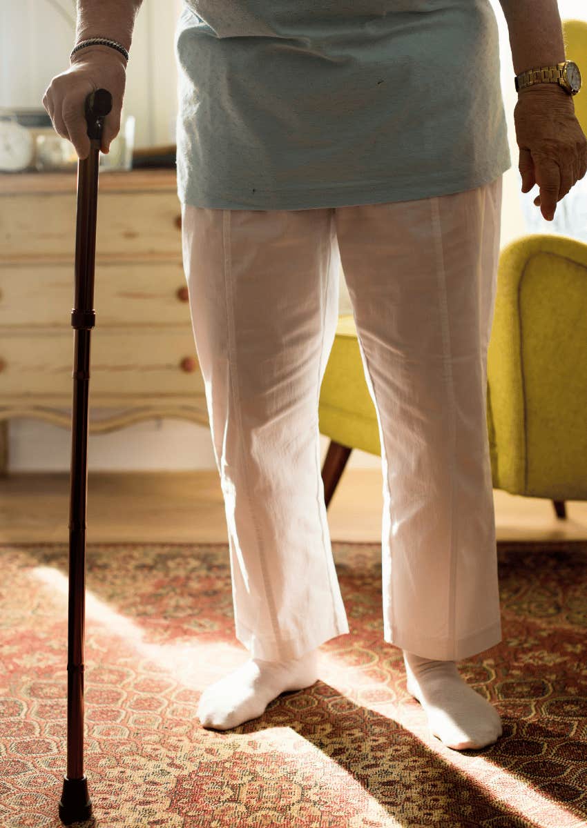 older woman using a walking assisting device