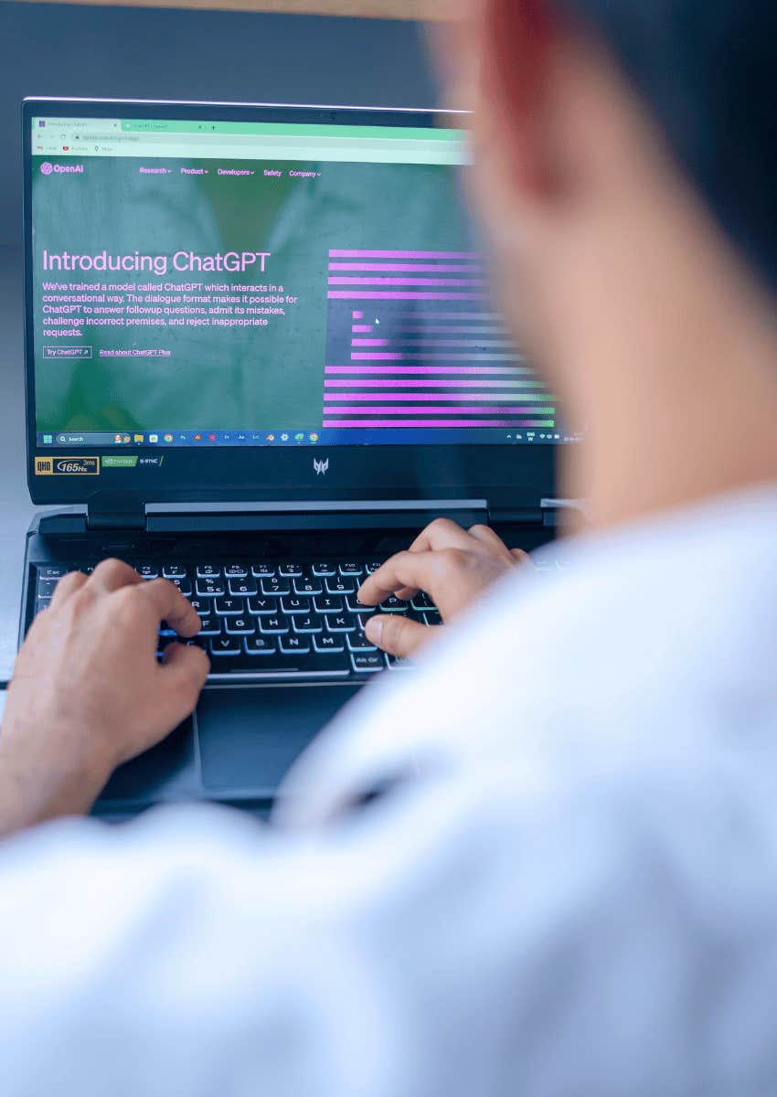 over a man's shoulder using chat-gpt