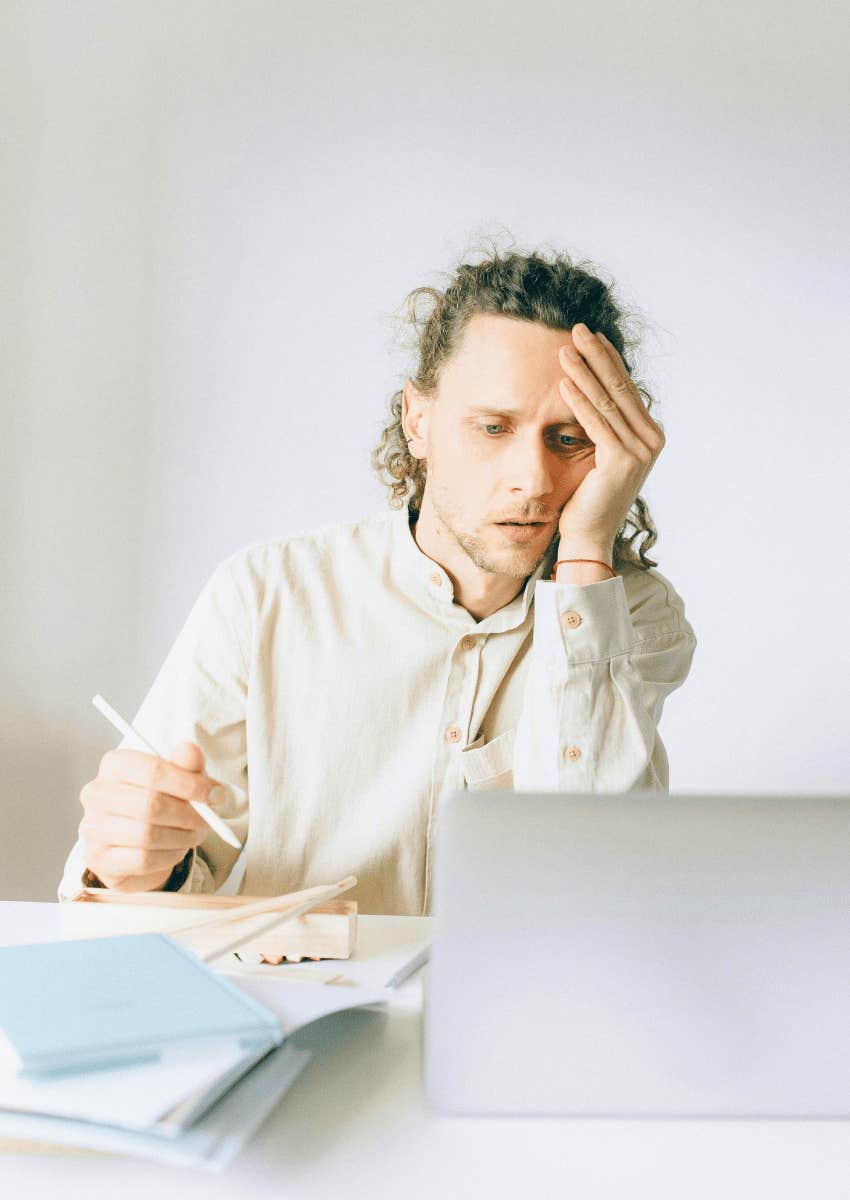 overworked employee doing the tasks of others