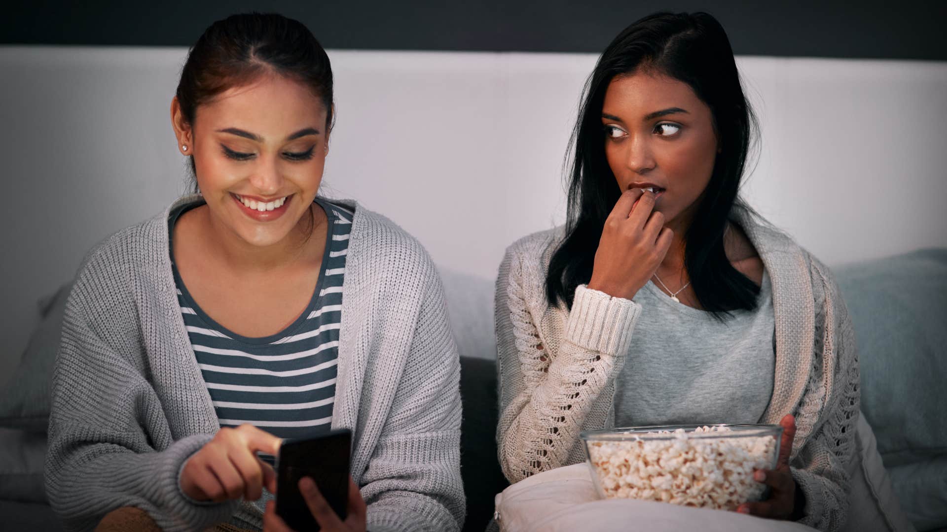 Grown daughter's friend acting rude eating popcorn