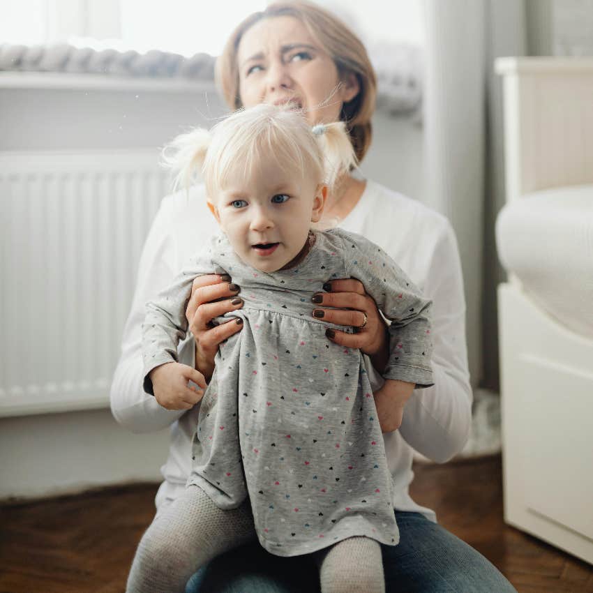 mom trying to respond correctly to her toddler's tantrum