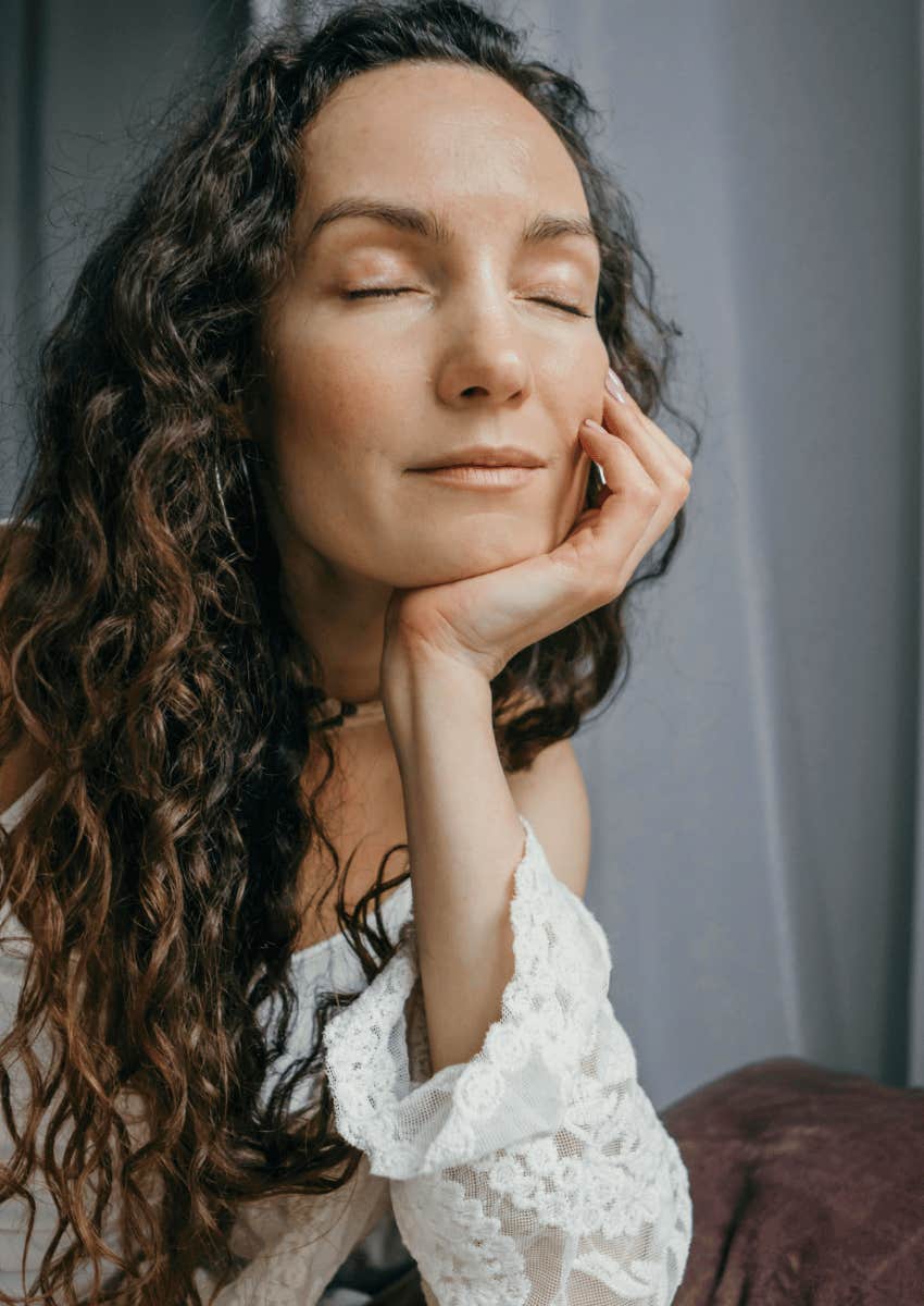 peaceful adult woman with her eyes closed