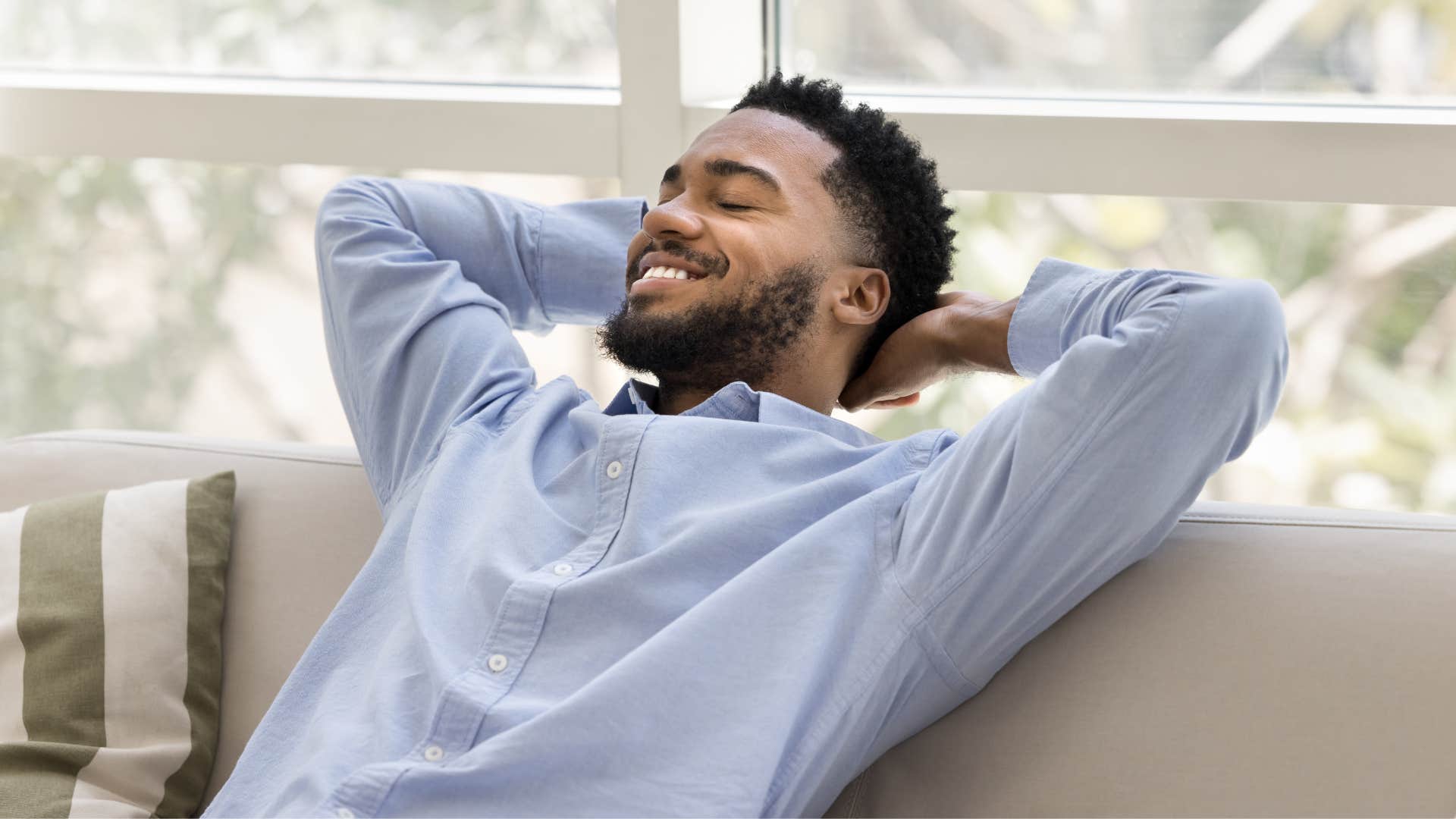 man likes having breathing room when traveling to the airport 
