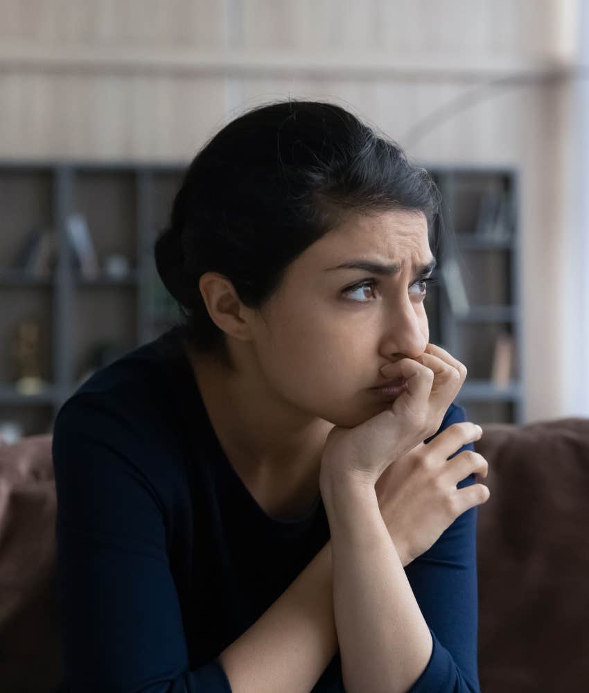 pensive person regrets trying too hard