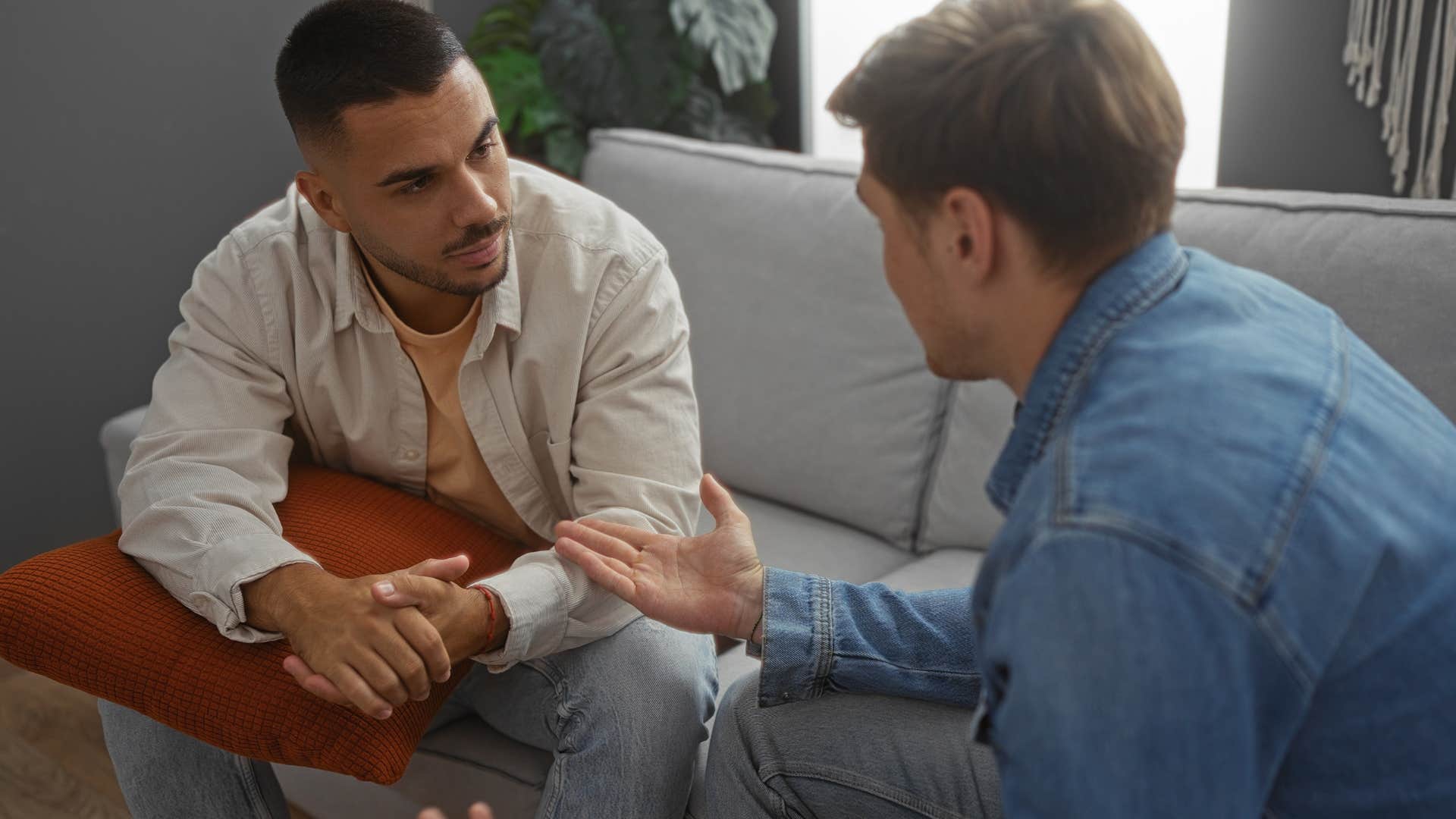 man who struggles with certain social norms talking to a friend