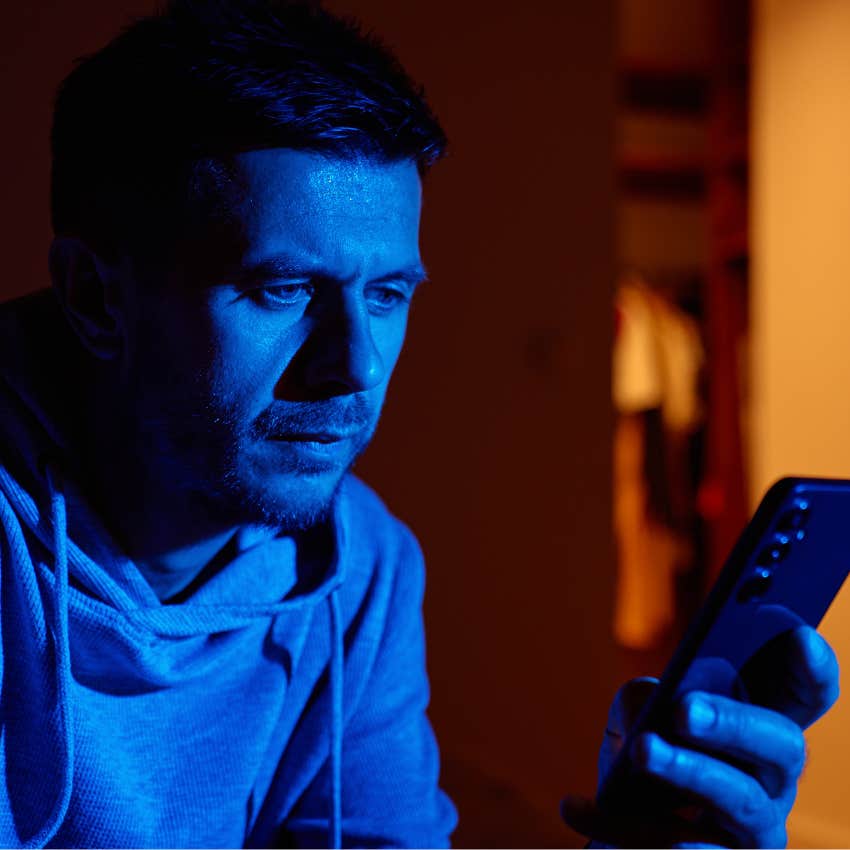 very bored man on his phone consuming more than he creates