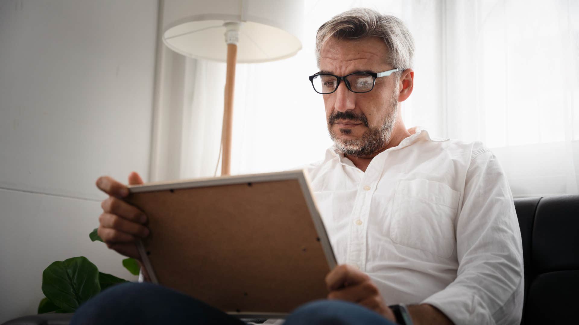 man who is sad about childhood memories