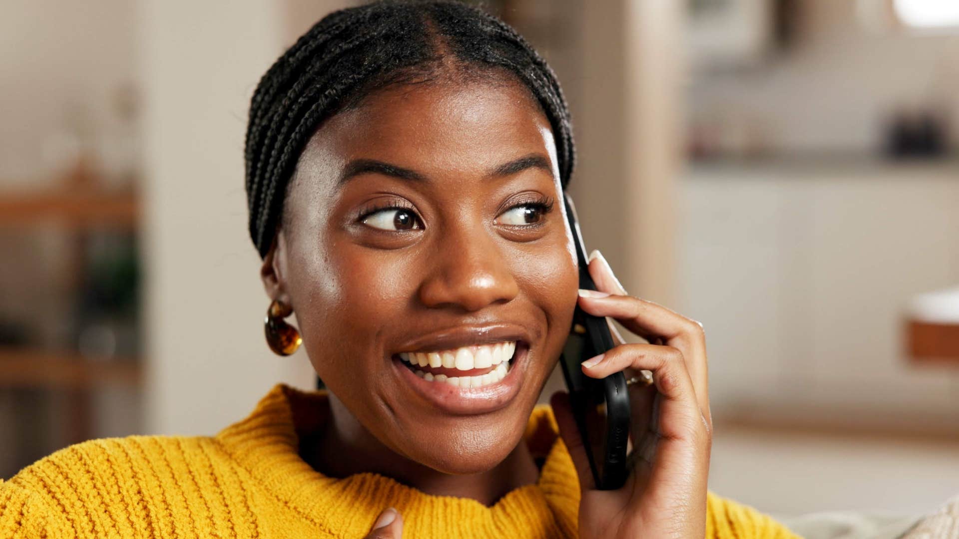 woman calling her parents often on the phone