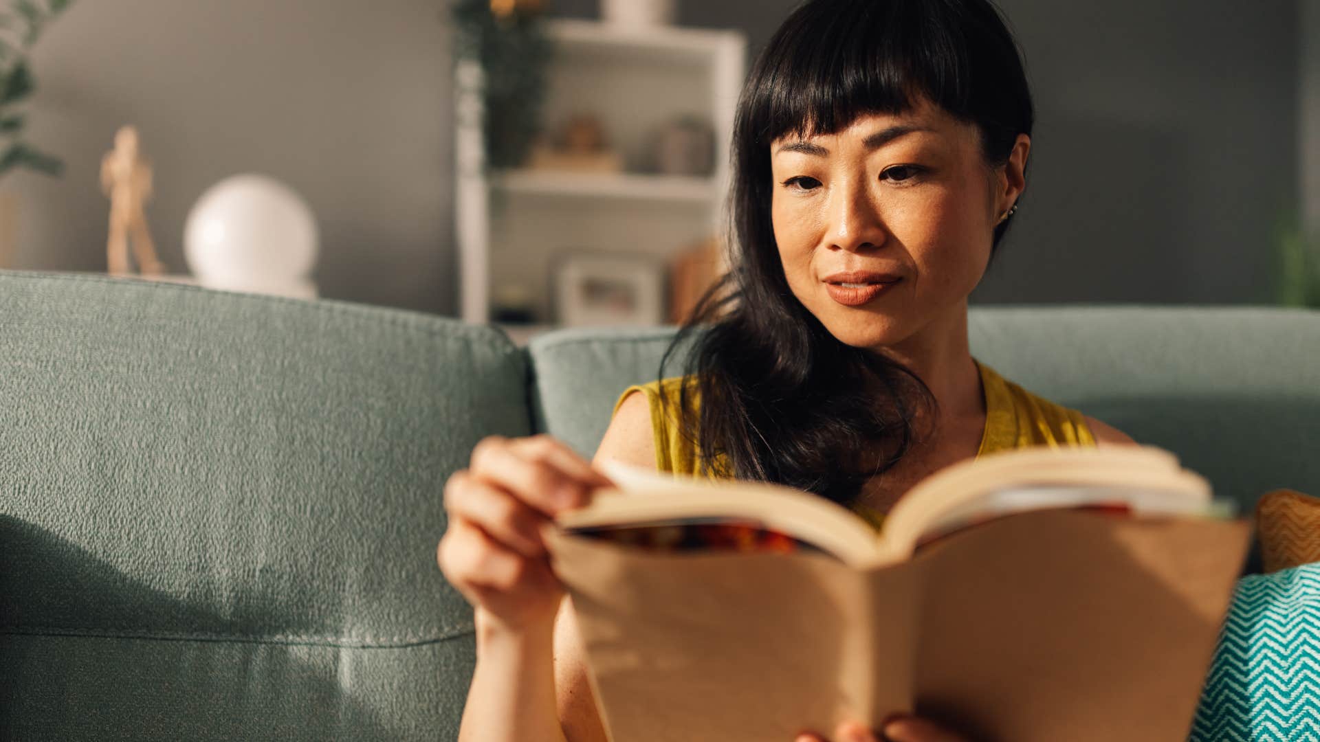 woman who grew up close to her parents comfortably appreciating alone time at home