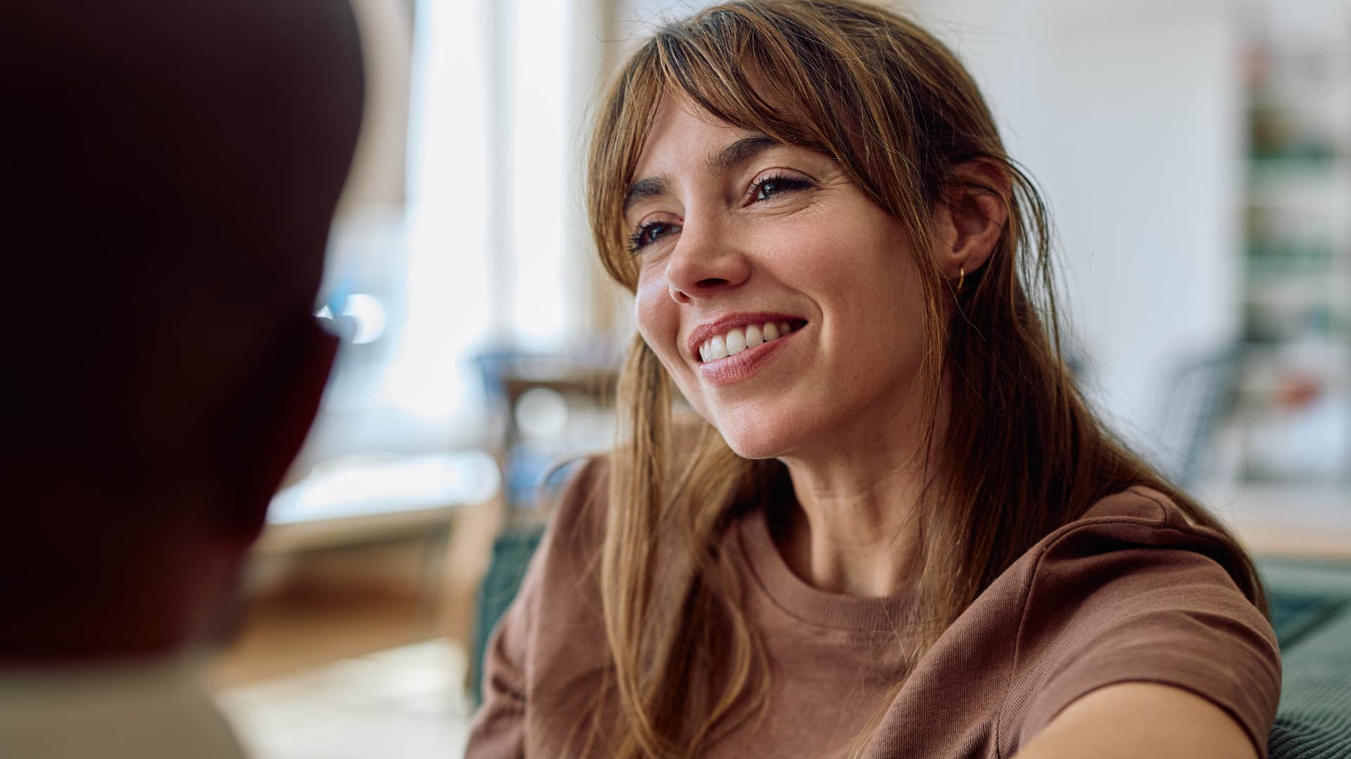 woman with high standards for relationships smiling at a partner