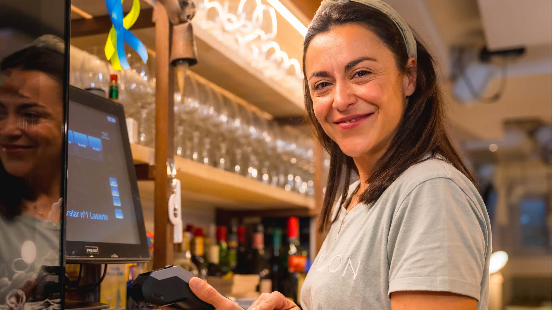 Humble and self-assured woman leaving a generous tip.