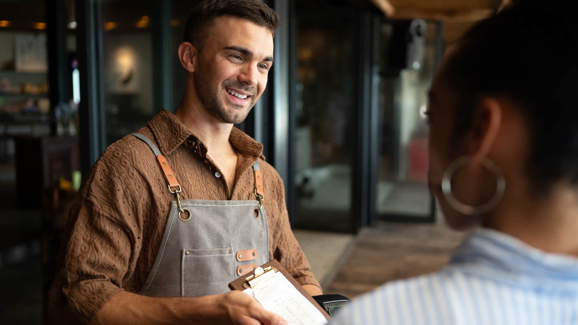 Incredibly empathetic woman leaving a tip for a barista. 