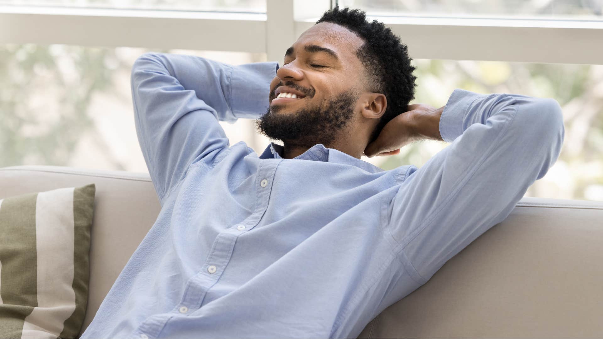 man who doesn't get FOMO sitting at home relaxing