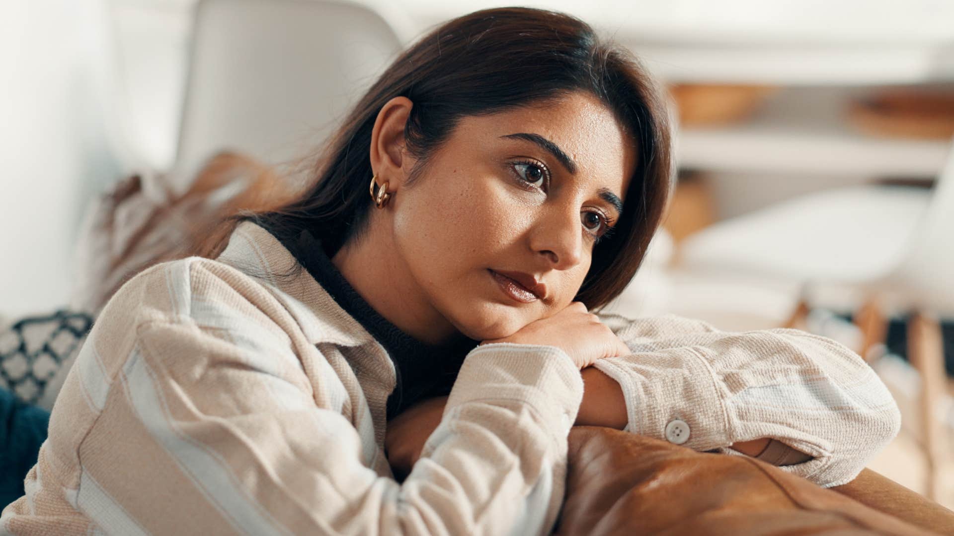 Woman living in fight or flight mode at home.