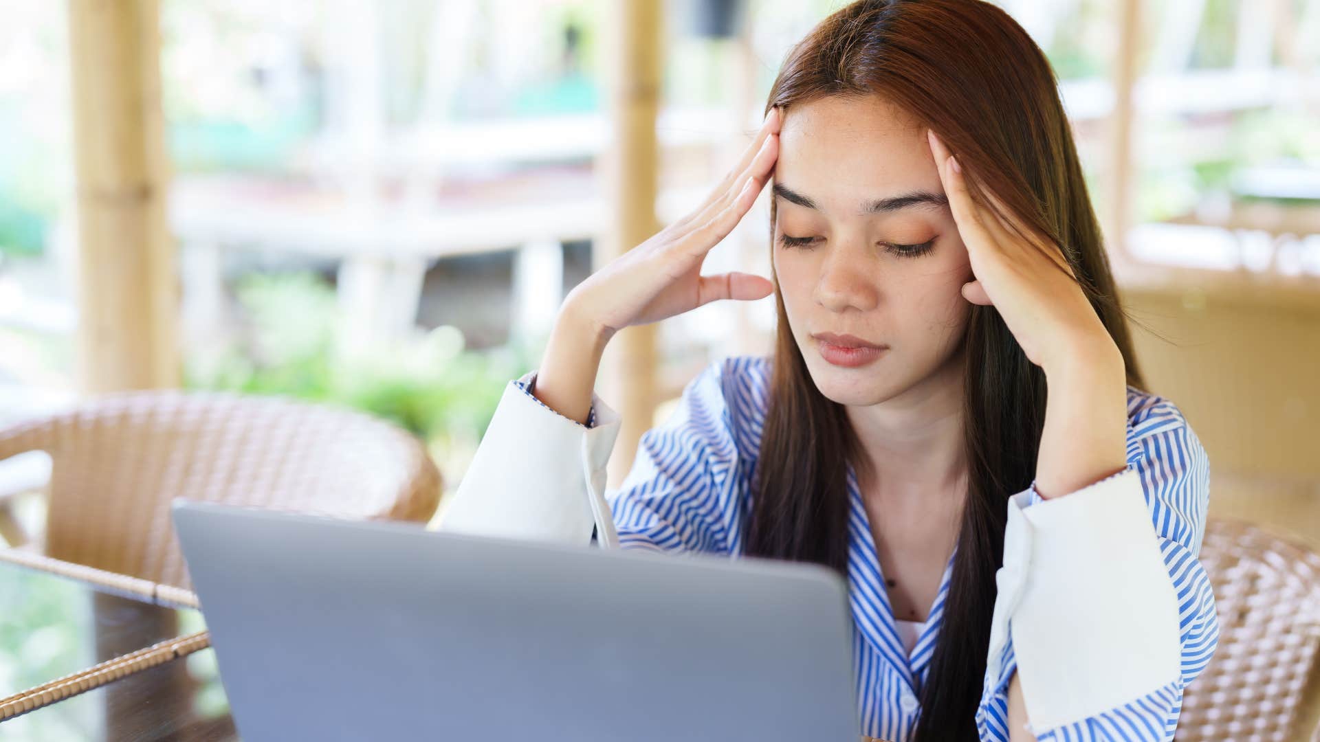 woman tapping her foot trying to work and overthinking