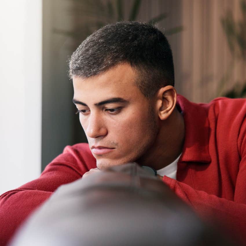 emotionally intelligent man thinking refusing to ignore his emotional patterns