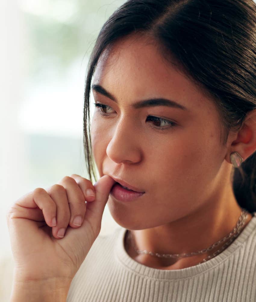 Anxious person bites thumbnail showing past trauma