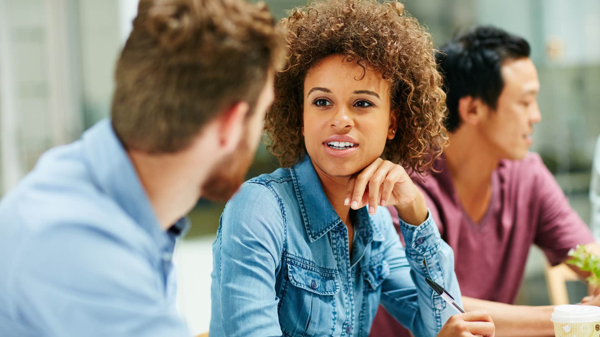 woman with rarest form of intelligence appreciating feedback from colleague