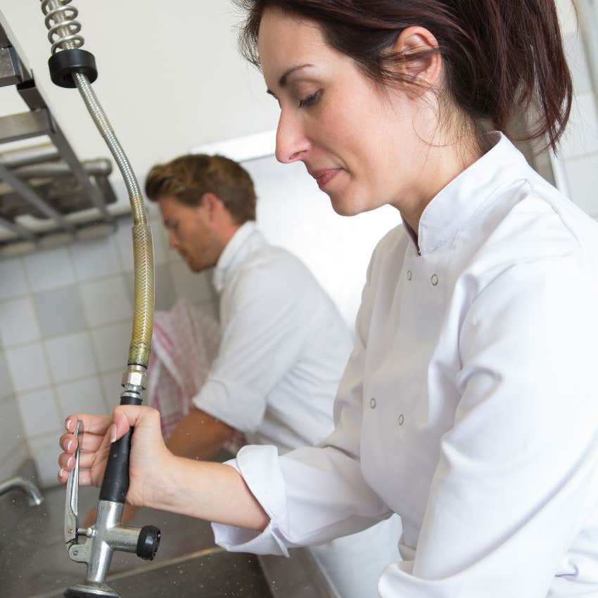 restaurant dishwasher in kitchen