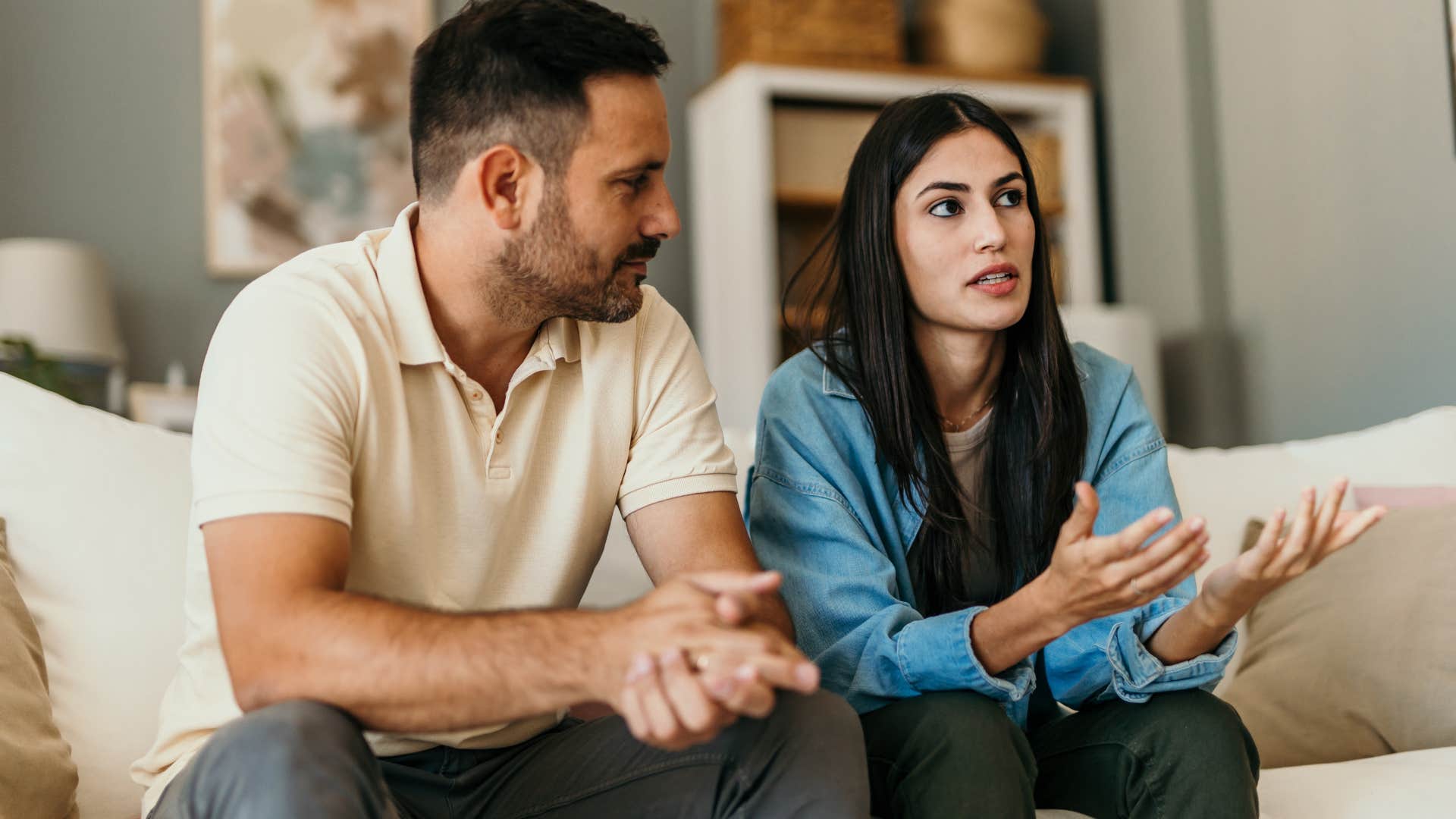 woman with good manners asking partner a question at home
