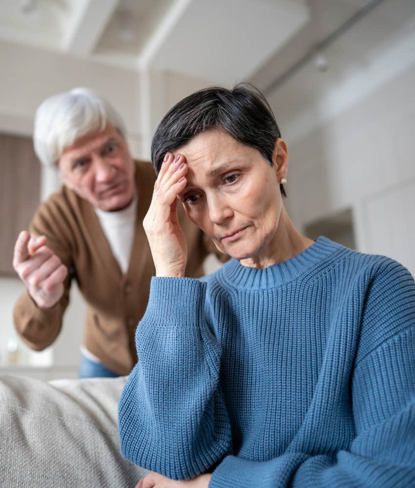 Upset person listens to angry spoue's denial