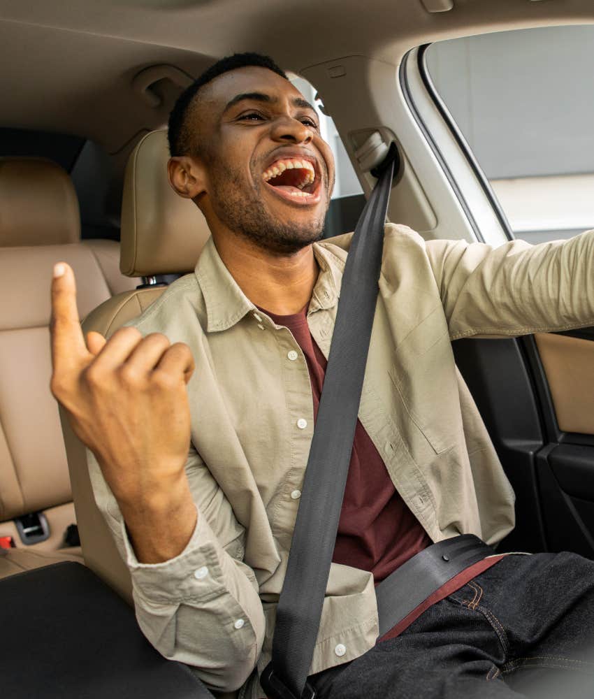 happy person sings in car to reduce stress