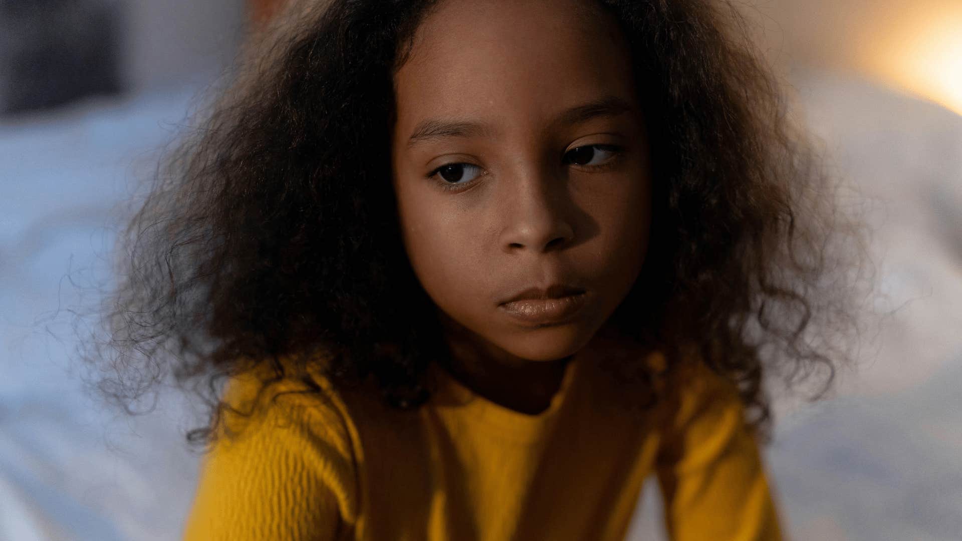 girl who avoids conflict because she is being raised in a house full of stress