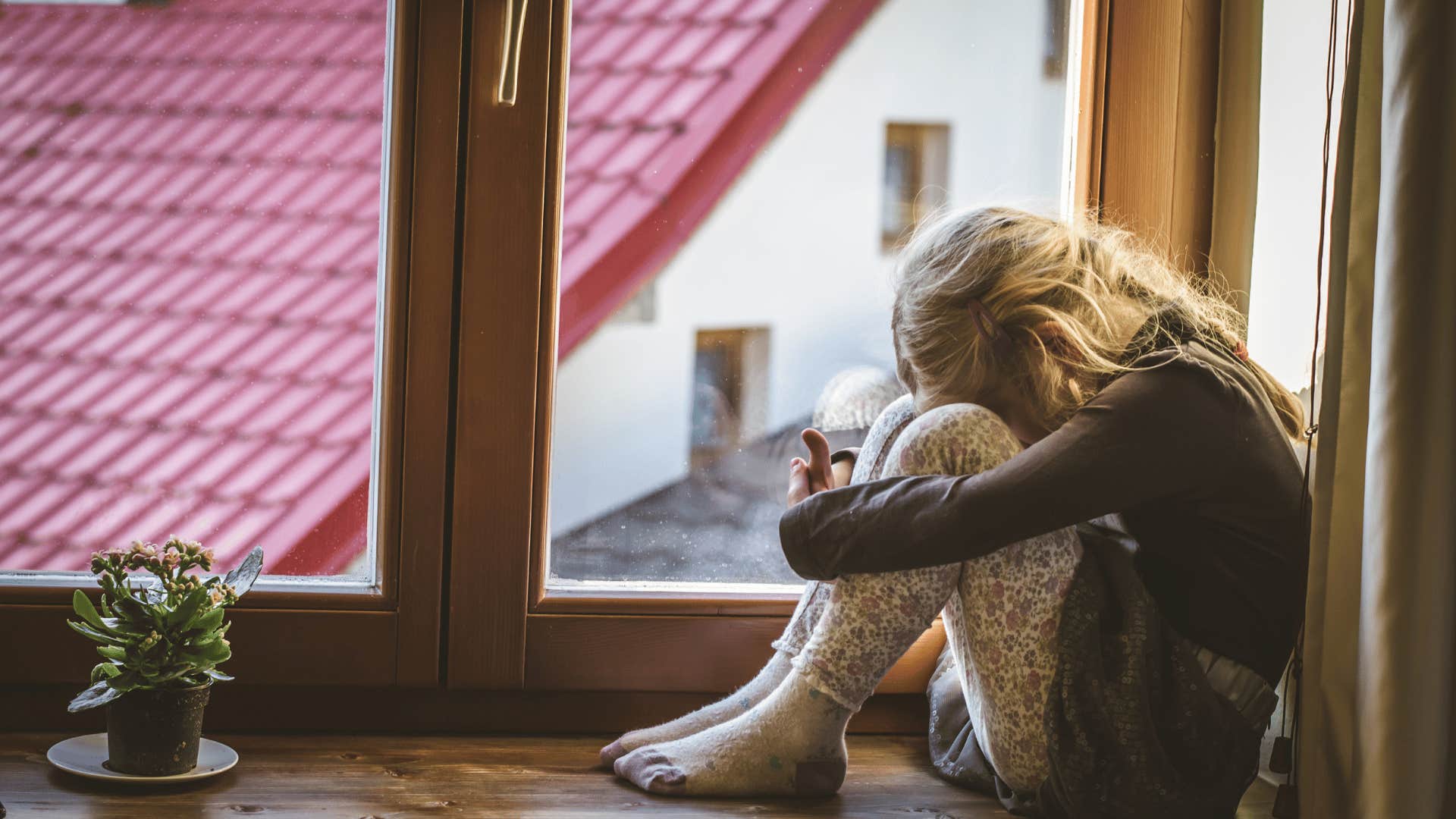 girl who feels a need to be perfect because she is being raised in a house full of stress