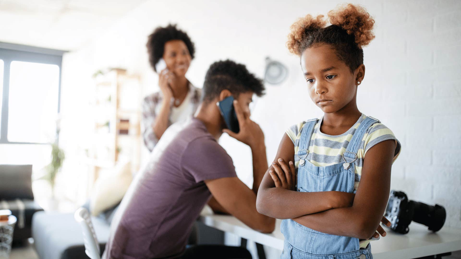 girl who suppresses her emotions because she is being raised in a house full of stress