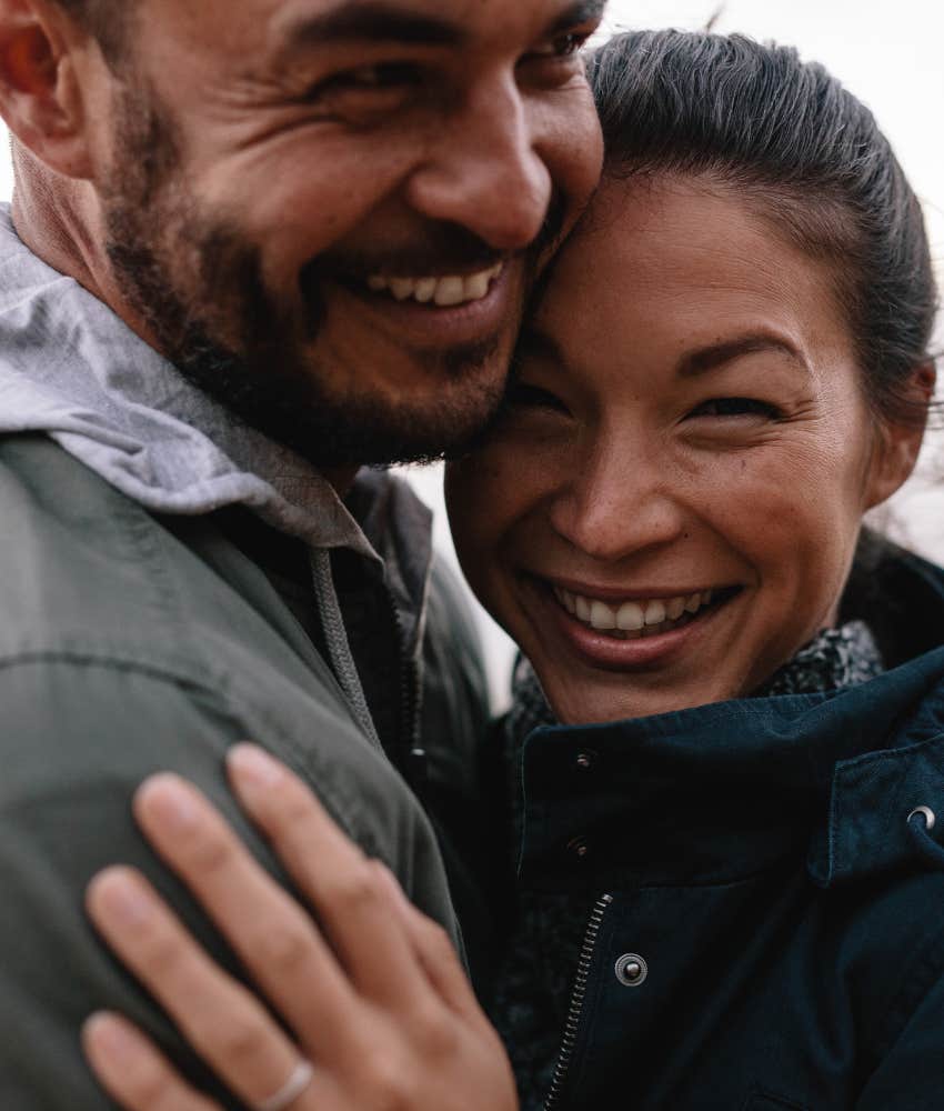 happy couple embrace showing communication safety in relationship