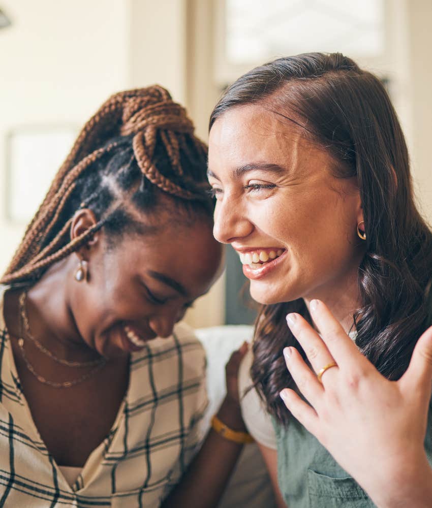 two people laugh showing habit to not spiral