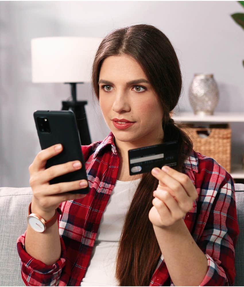impulsive person with phone and credit card showing issue with self control