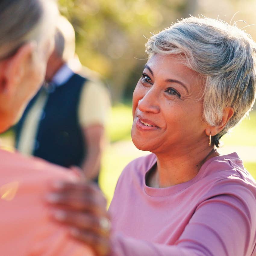 compassionate woman asking stranger how can i help