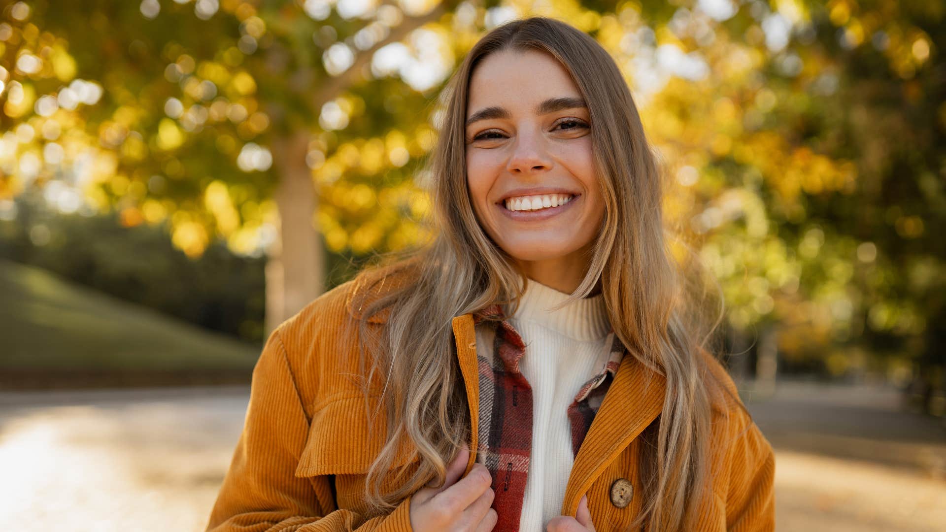 joyful woman saying i'm so happy for you to friend
