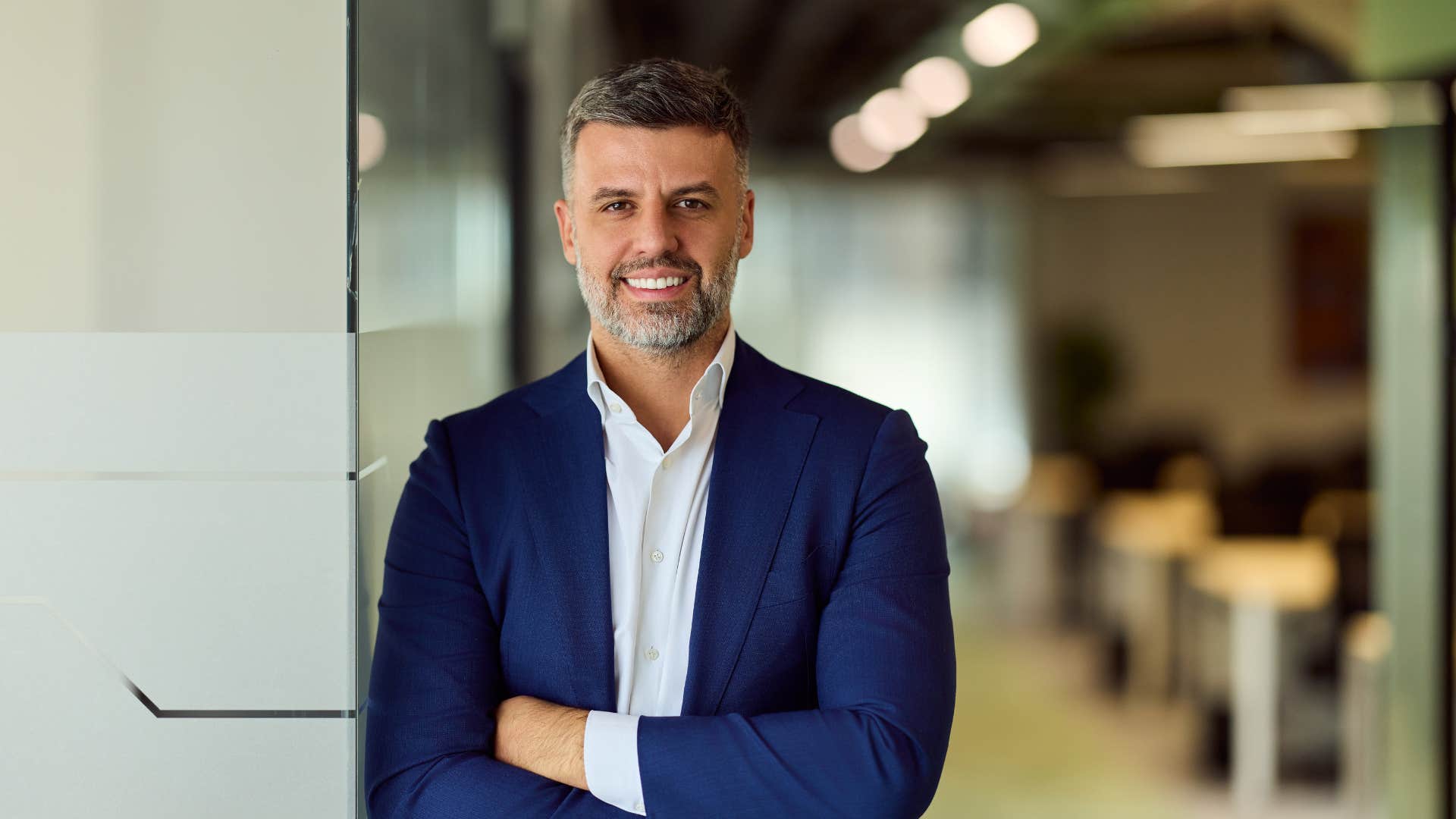 joyful professional man saying i'm so proud of myself