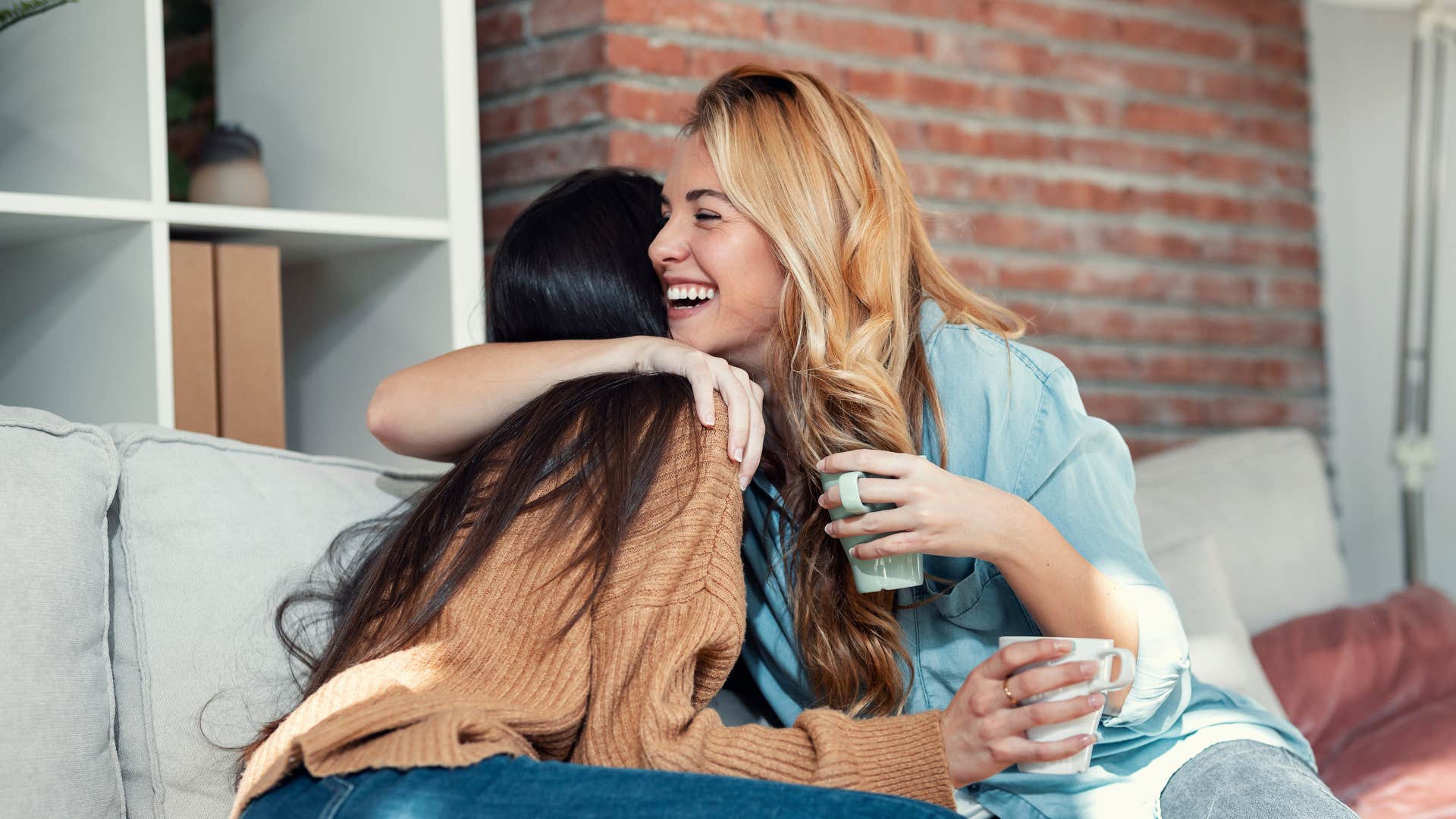 friends hugging tightly woman saying that really meant a lot to me