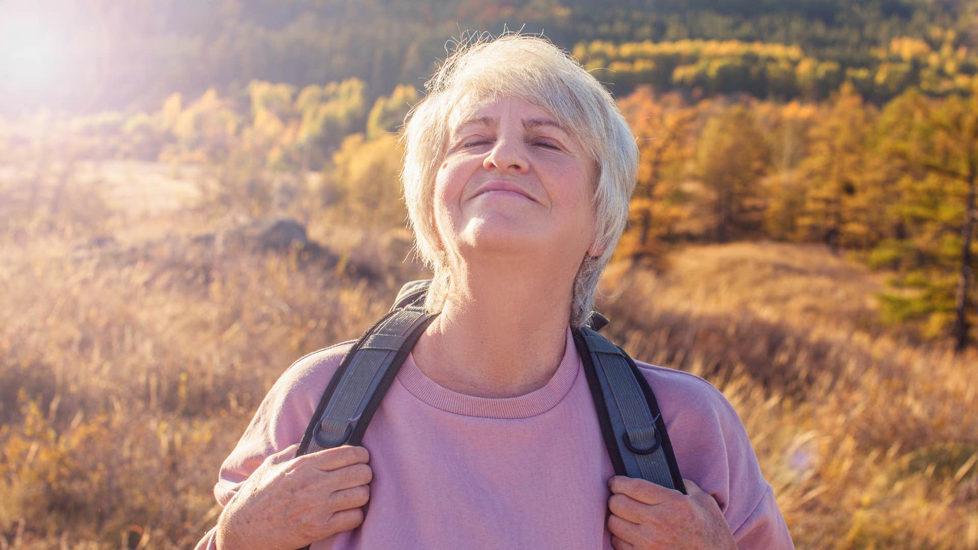 older woman on a hike learning to let go